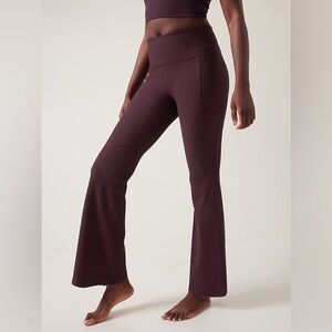 Athleta burgundy salutation stash rib flare